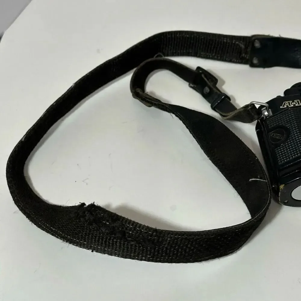 Vintage Canon A-1 Black 35 mm SLR with Strap/ Body Only